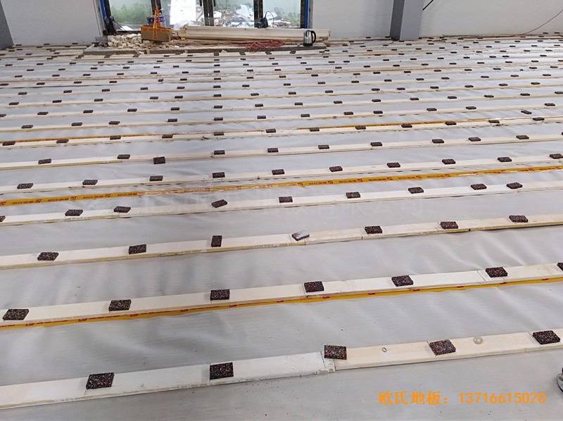 安徽懷寧縣新明源電力公司羽毛球館運動木地板施工案例3