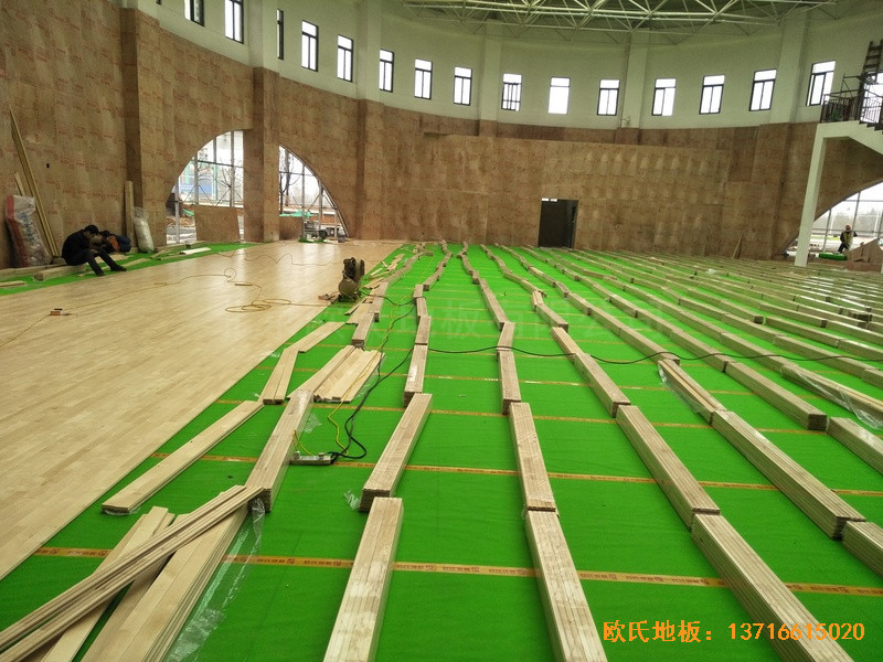 江西榮江金色春城小學(xué)運(yùn)動(dòng)館運(yùn)動(dòng)木地板鋪設(shè)案例3